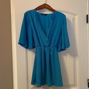 Flowy blue cocktail dress
